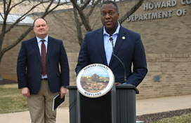 A photo of County Executive Calvin Ball speaking at a press conference about fully funding Howard County Public School System's Fiscal Year 2026 Capital Budget request.