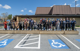 Group of dignitaries with shovels at groundbreaking of Performing Arts Center