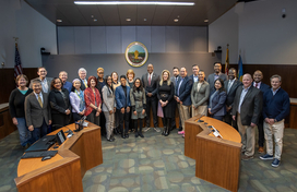 A photo of County Executive Calvin Ball with members of his Economic Competitiveness and Opportunity Now Task Force at his press conference announcing the release of the Task Force's report.