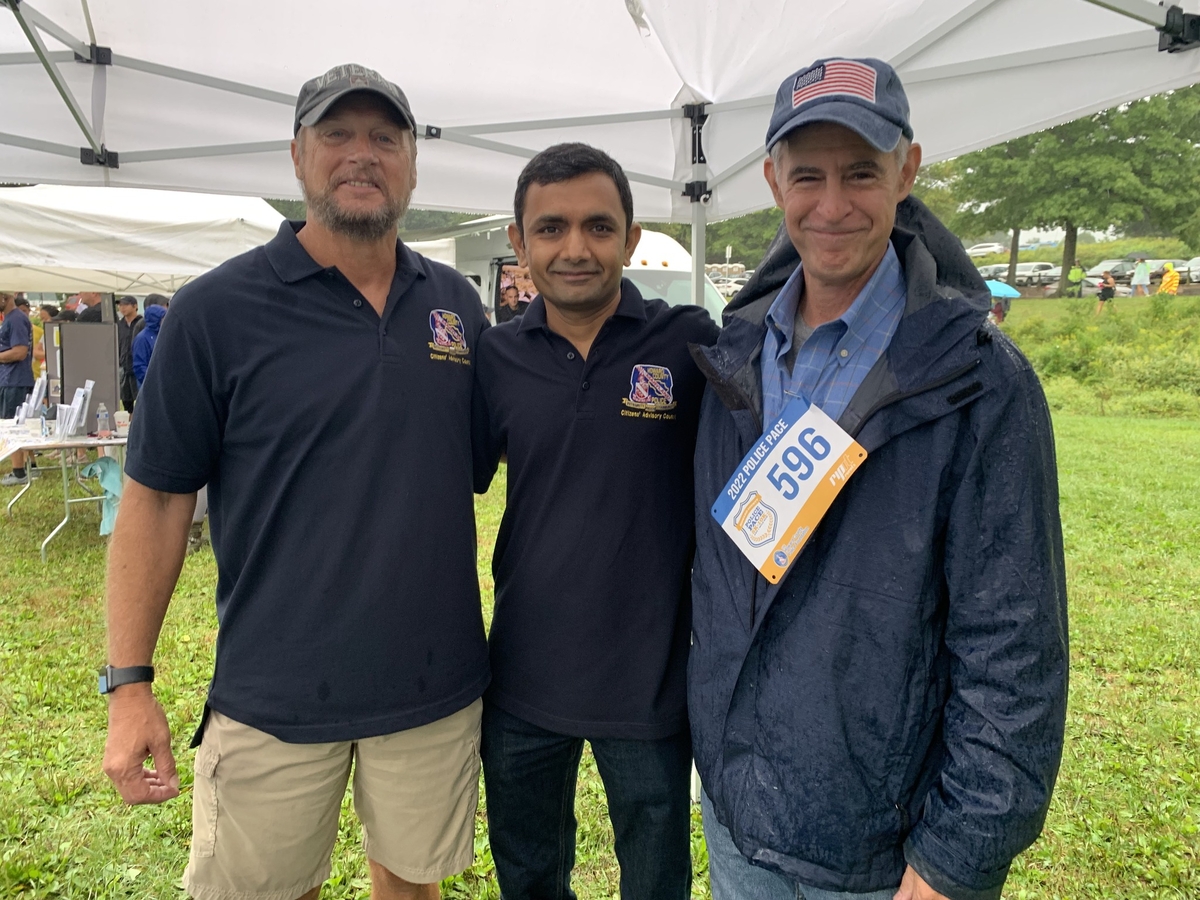 Three members of CAC posing at Police Pace