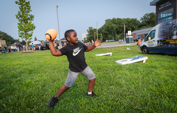 Boy playing with a football