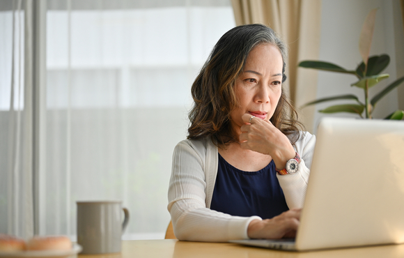 Woman works on computer