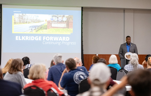 A photo of County Executive Calvin Ball speaking to attendees at his October 7th 2025 Elkridge Forward community meeting.