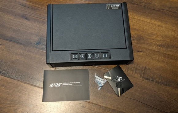 handgun lockbox placed on a table