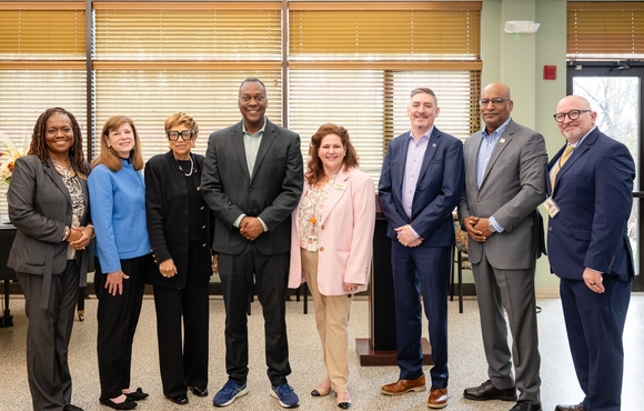 County Executive Calvin Ball with members of the County's Department of Community Resources and Services and other posed for a photo at the announcement that the County has joined the National Dementia-Friendly network.