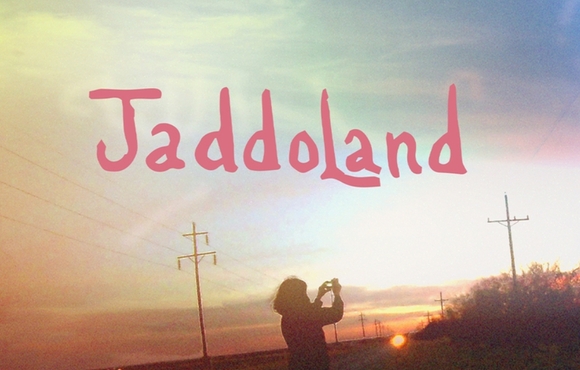 An outdoor sunset with the text 'Jaddoland'