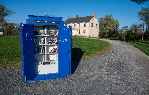 A replica of the blue British Police box TARDIS that was a time-travelling spaceship found in the British science fiction television series Doctor Who. Howard County's TARDIS serves as a traveling Little Free Library that is now featured near the white Clove Hill house at the County's Rockburn Branch Park West in Elkridge.