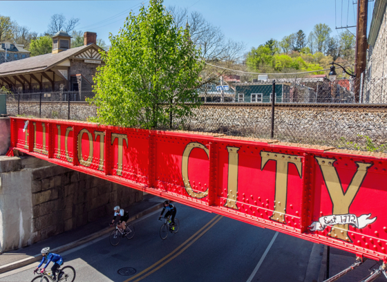 A photo of the famous red railroad sign that reads Ellicott City