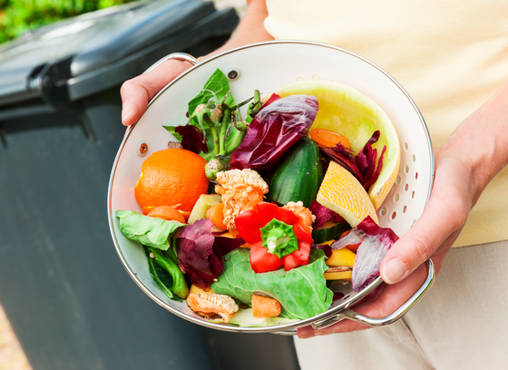 colander filled with food scraps
