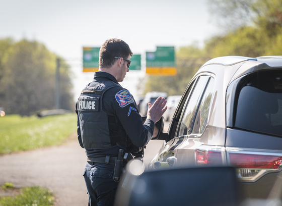 Officer providing education to stopped motorist
