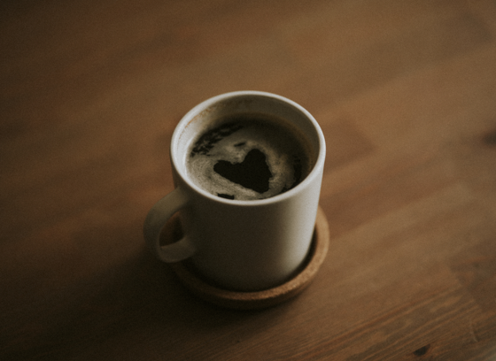 Coffee cup on a wooden table.