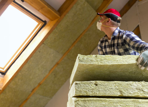 Person putting insulation up