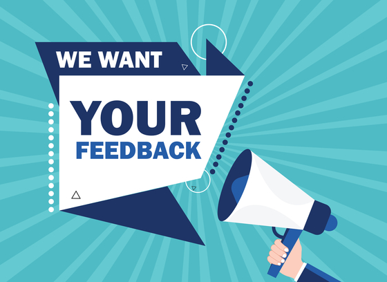 Light teal background with megaphone and text that says We Want Your Feedback