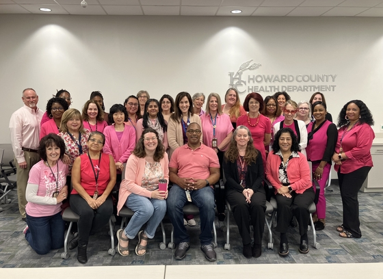 Large group of HCHD staff wearing pink to support breast cancer