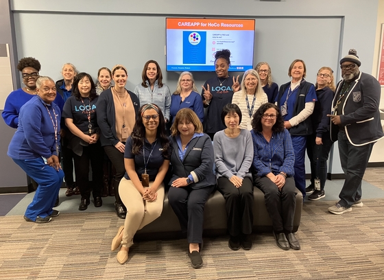 Large group of HCHD staff wearing blue to support colorectal cancer