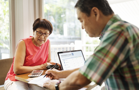 senior man and woman working together