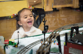 Girl looking at train