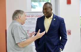 County Executive Ball talking about the Age-Friendly Action Plan with a communitymember.