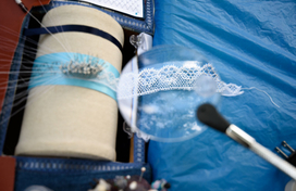 handmade lace under magnifying glass