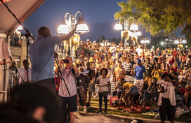man speaks to a crowd