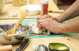 hand rolling sushi