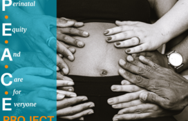 hands holding pregnant belly