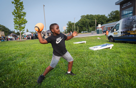 Boy playing with a football