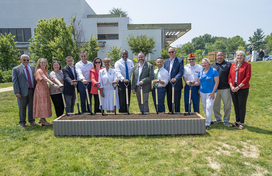 A photo of County Executive Calvin Ball and attendees ready to break ground on Howard County's new Veterans and Military Family Monument.