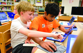 two boys on computer 