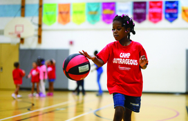 girl playing basketball 