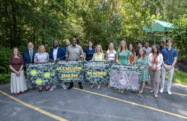 A photo of County Executive Calvin Ball and representatives from the Howard County Conservancy and Watermont Swim Club to annouce the announce the completion of the third land preservation easement through the Purchased Conservation Easement Program.