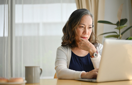 Woman works on computer