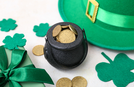Mini pot of gold, green hat and cut out shamrocks.