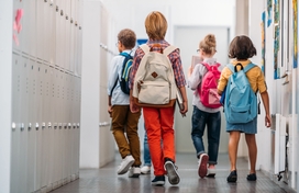 Photo portraying children heading Back to school 