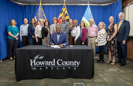 Group legislation signing allowing Age-Restricted Adult Housing Cottage Clusters