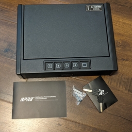 handgun lockbox placed on a table