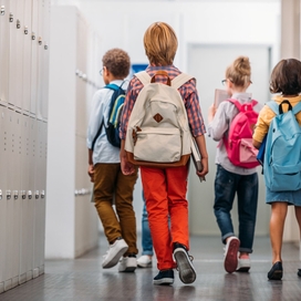 Photo portraying children heading Back to school 